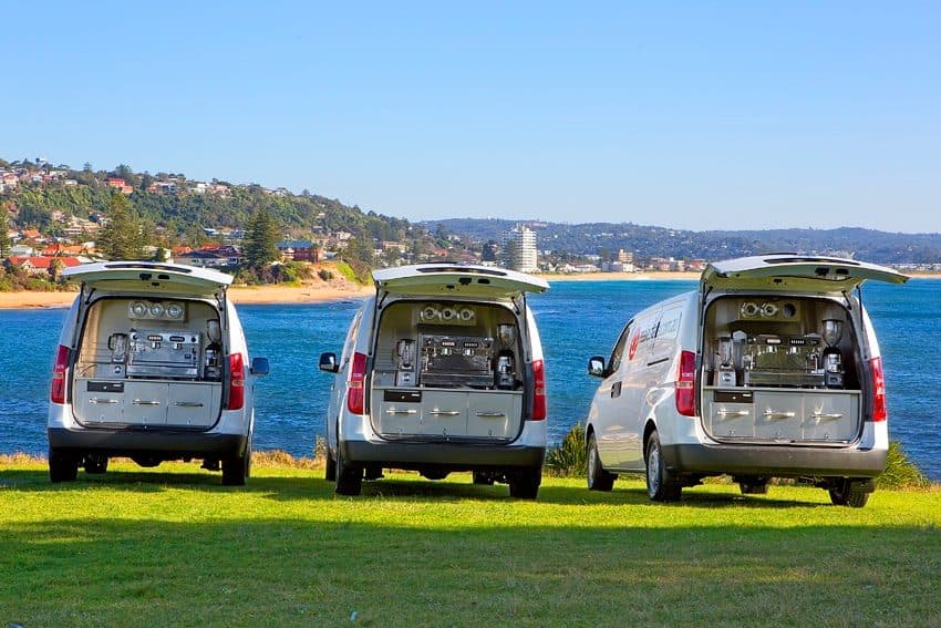 A row of pre-loved coffee vans listed on Coffee Van Classifieds